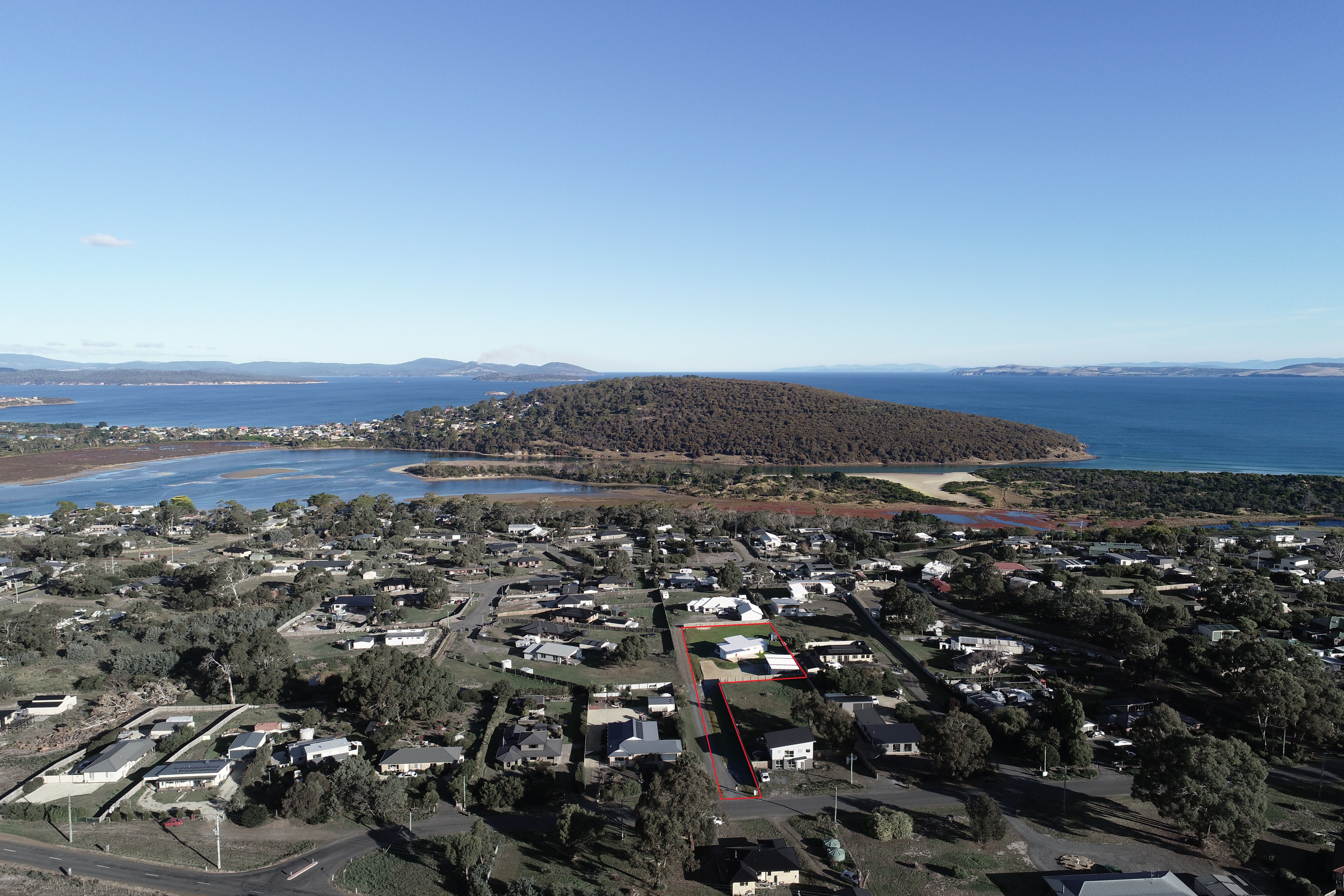 45 Provence Drive features a modern family home on a large level block with water views.